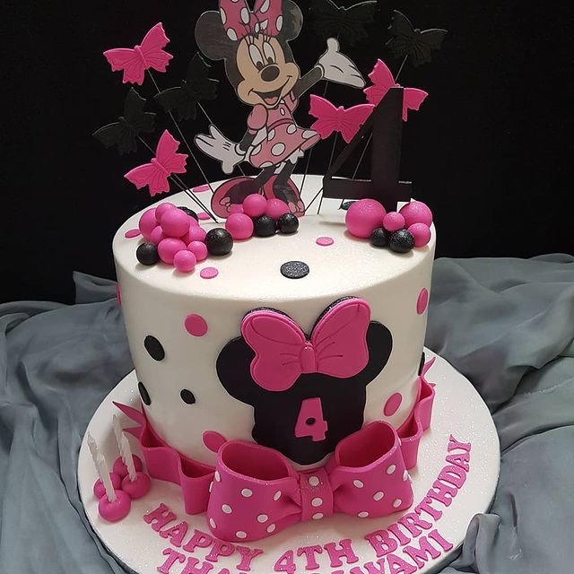 Not Sorry Cafe - A Minnie Mouse themed birthday cake for Amelia Rose• • • •  • • • #madetoorder #cake #cakedecorating #instacake #cakesofinstagram  #customized #buttercream #firstbirthday #birthday #minnie #cake #americolor  #localeats #